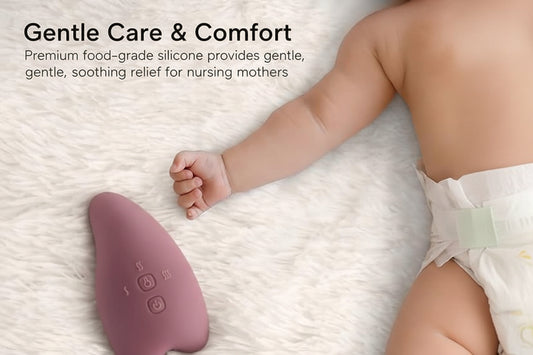 Momcozy Double warming and Lactation Massager on soft surface, designed for comfortable breast massage with heat and vibration.